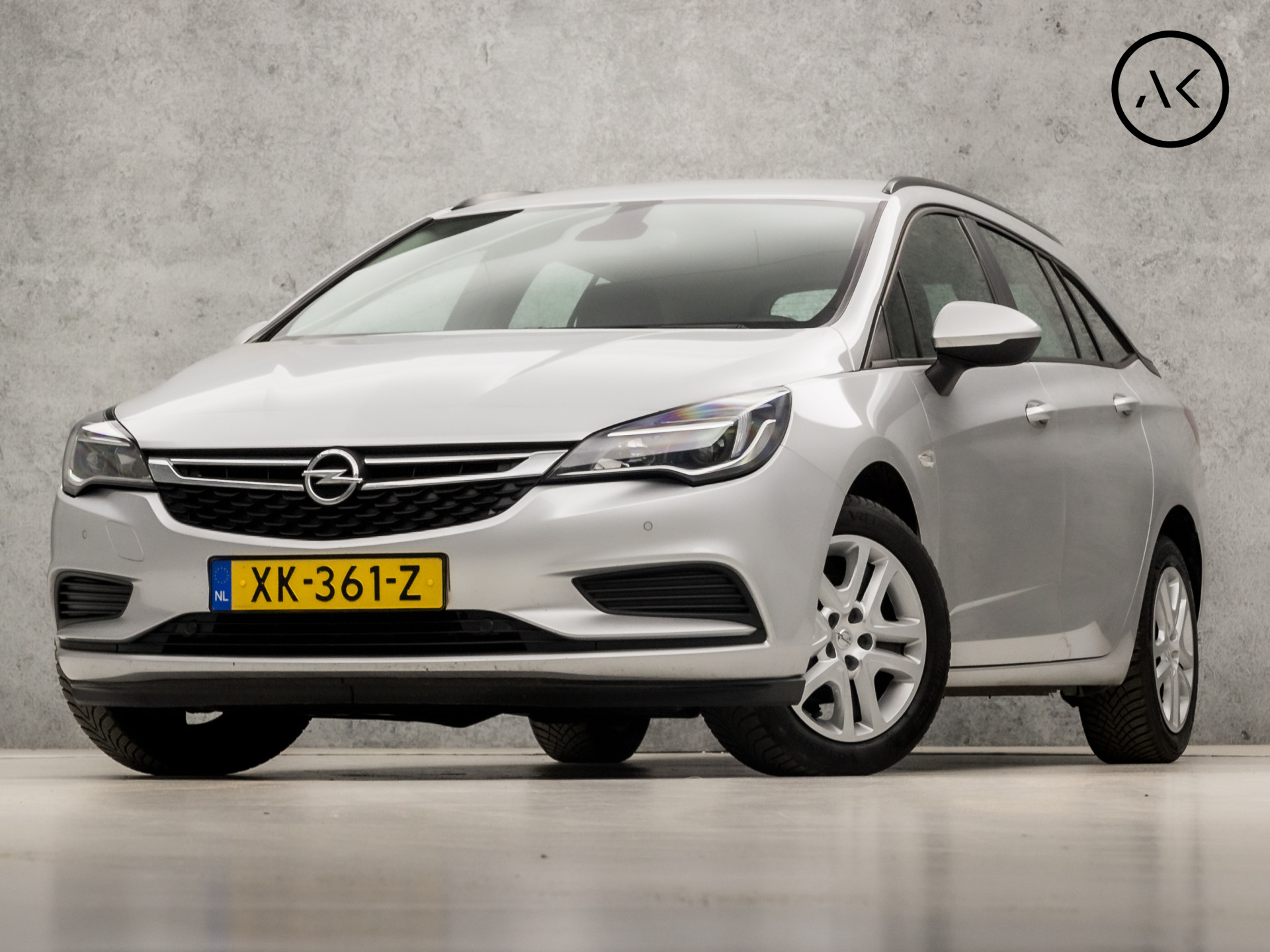 Opel Astra Sports Tourer 1.0 Online Edition (APPLE CARPLAY, NAVIGATIE, PARKEERSENSOREN, SPORTSTOELEN, CRUISE, BLUETOOTH, NIEUWSTAAT)