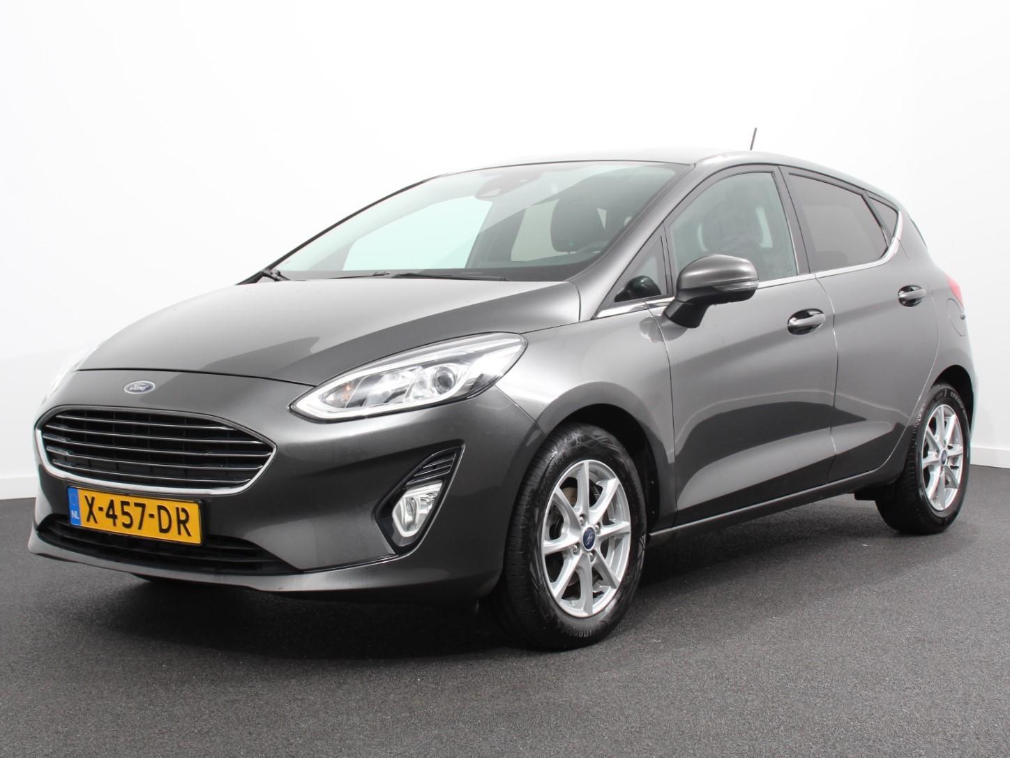 Ford Fiesta 1.0 EcoBoost Titanium | Navigatie | Climate Control | Parkeer sensoren | Cruise control | Stoelverwarming | Lichtmetalen Velgen