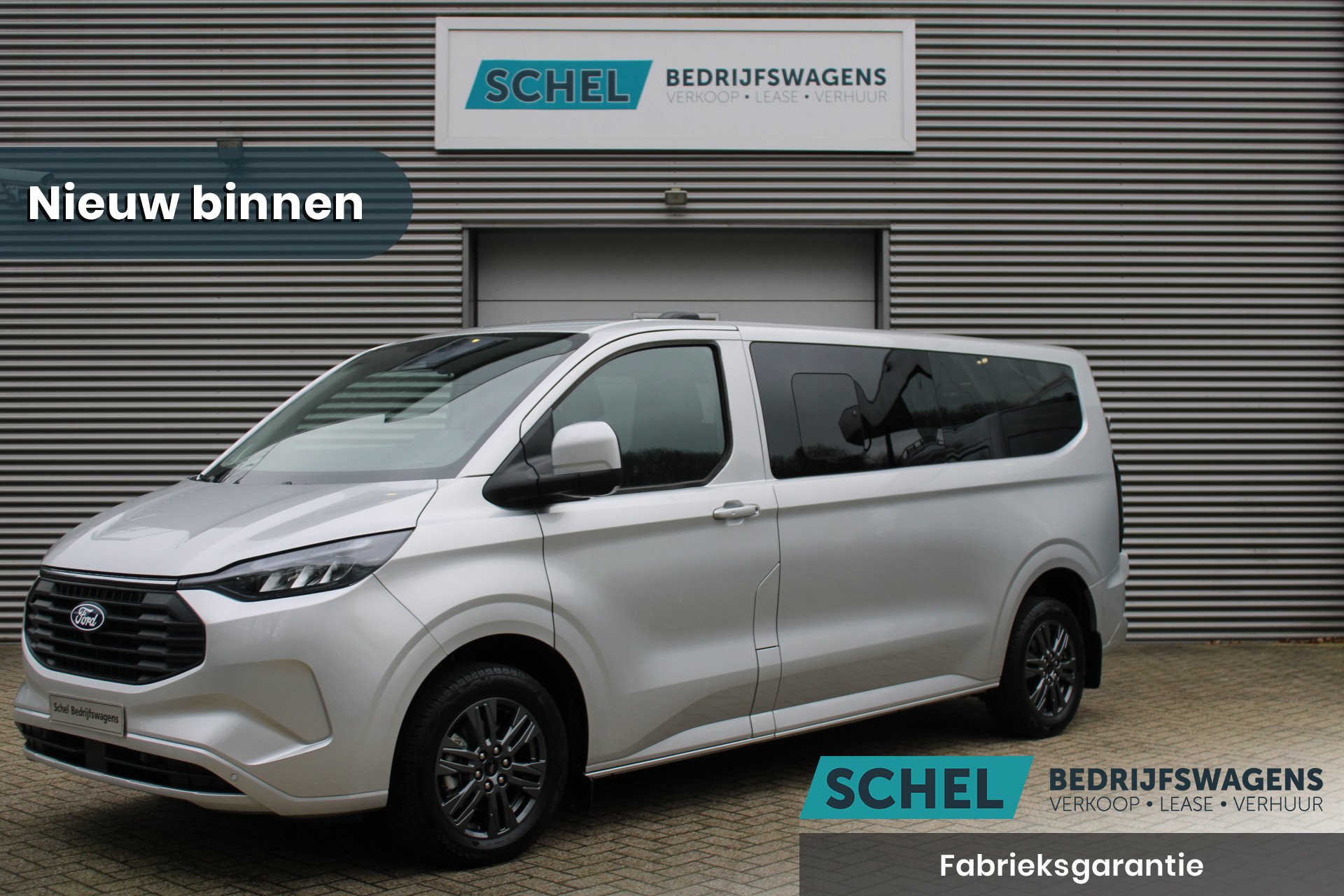 Ford Transit Custom 340 2.5 PHEV L2H1 Limited 232pk - 9 zits - Adaptive Cruise - Blind spot - Navi - Stuurverwarming - Airco achterin - Rijklaar