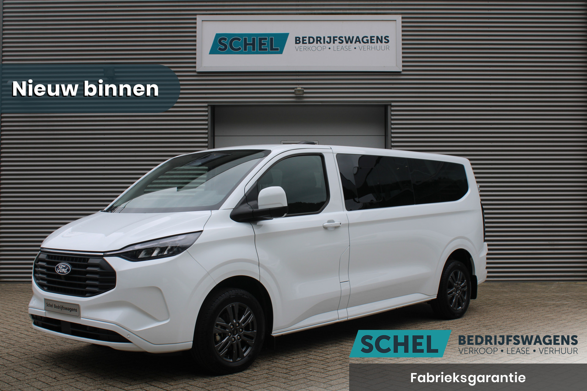 Ford Transit Custom 340 2.5 PHEV L2H1 Limited 232pk - 9 zits - Adaptive Cruise - Blind spot - Navi - Stuurverwarming - Airco achterin - Rijklaar