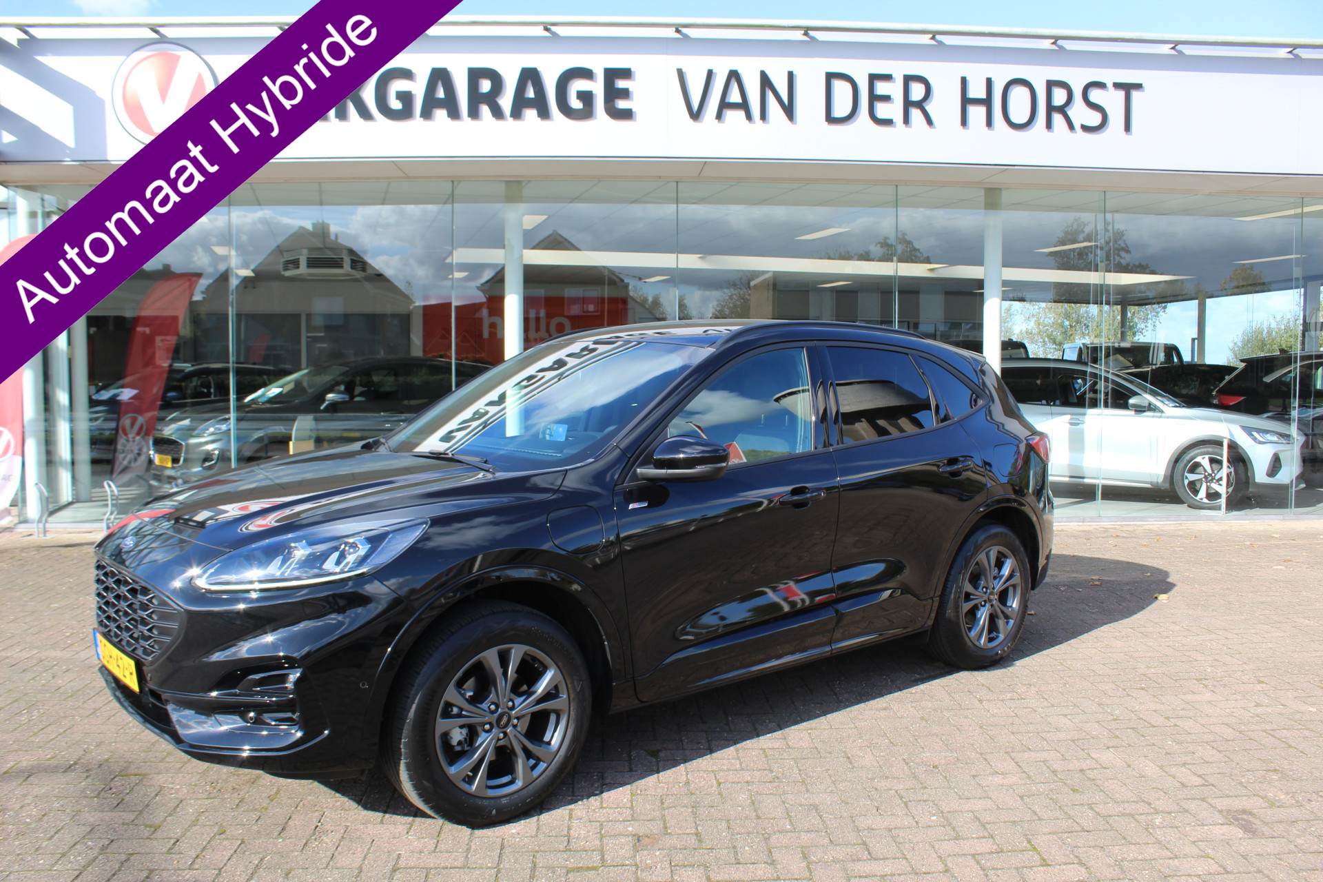 Ford Kuga 2.5-225 pk Hybrid PHEV ST-Line X. Trekgewicht 1.500kg ! Slechts 11.000km ! Volautm. airco dual, lane- en side assist, camera v+a, adaptive cruise control, elektr. achterklep, stoel-, stuur- en voorraam verwarming, LM wielen, metallic lak, easy entry/easy go etc.