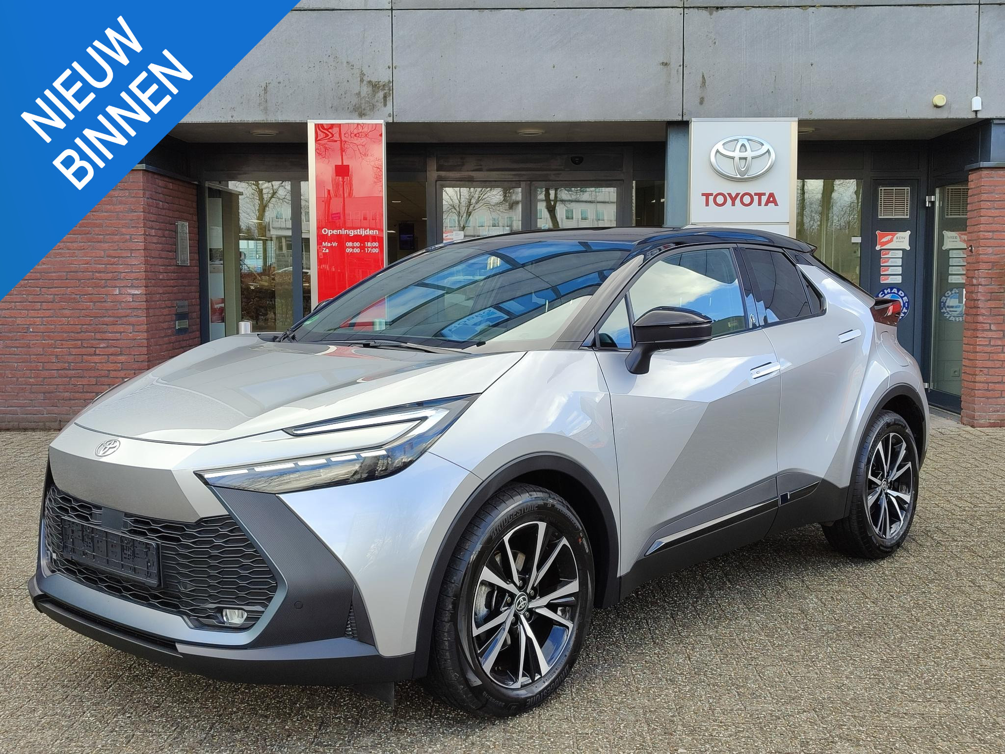 Toyota C-HR 2.0 Hybrid 200 STYLE BI-TONE STOEL/STUURVERW EL-ACHTERKLEP NAVI KEYLESS BLIND SPOT 18'' LM-VELGEN PARK-SENSOREN APPLE/ANDROID CLIMA AD-CRUISE