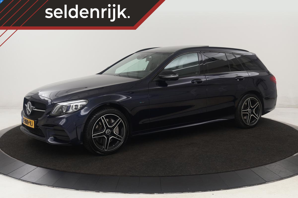 Mercedes-Benz C-Klasse 300e AMG | Panoramadak | Stoelverwarming | 360 camera | Trekhaak | Carplay | Dodehoek detectie | Matrix LED | Navigatie | Half leder