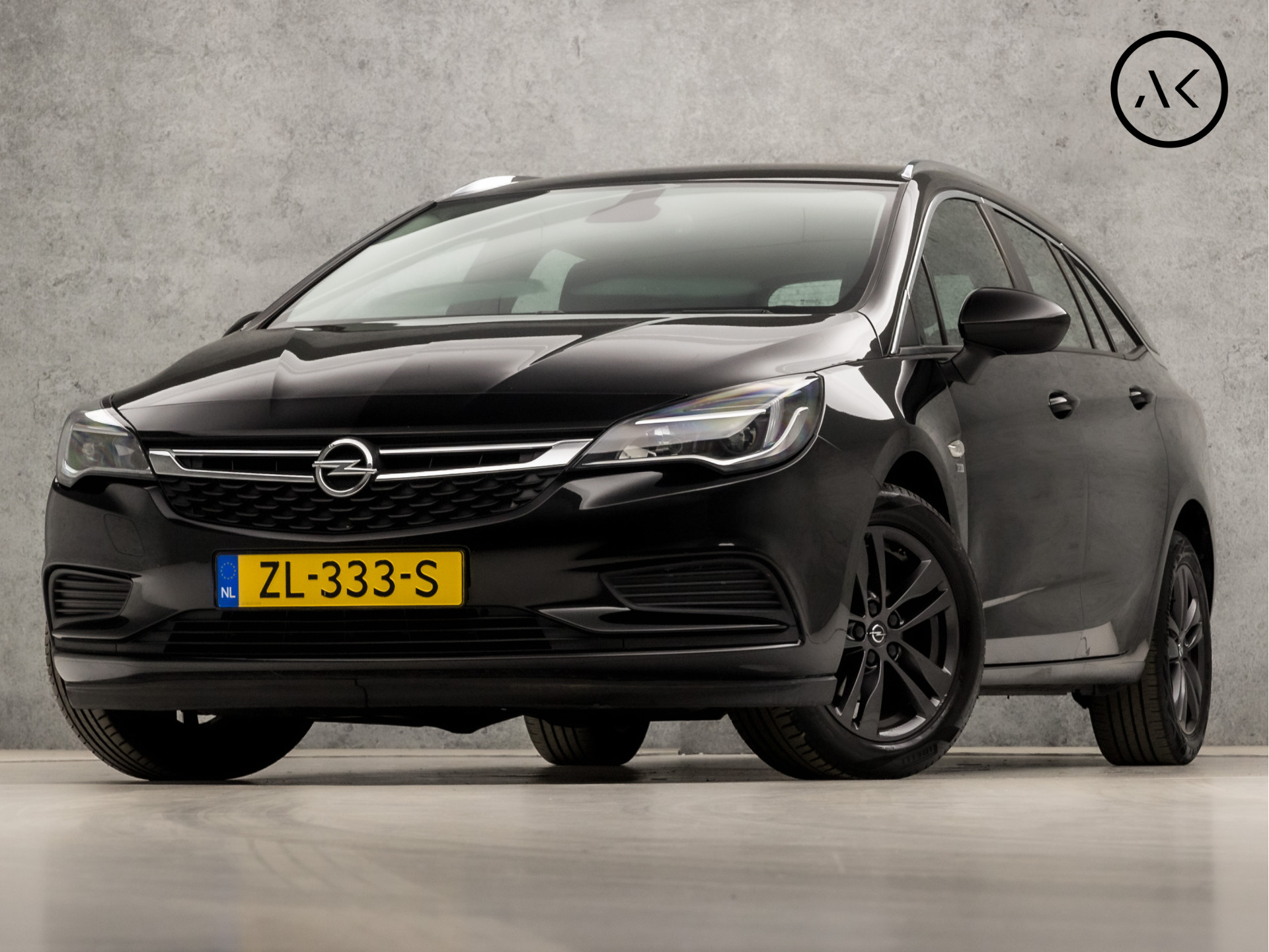 Opel Astra Sports Tourer 1.0 Turbo 120 Jaar Edition (APPLE CARPLAY, NAVIGATIE, LM VELGEN, SPORTSTOELEN, XENON, CRUISE, ARMSTEUN, NIEUWSTAAT)