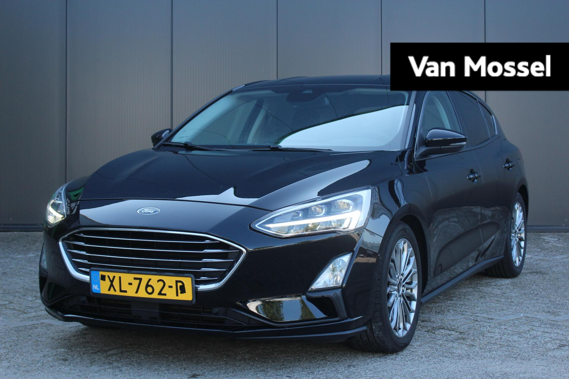 Ford Focus 1.0 EcoBoost 125Pk Titanium Business | Apple & Android Carplay | Climate Control | Parkeersensoren Voor & Achter + Camera | Privacy Glass | Adaptieve Cruise Control | Licht & Regensensor | B&O Premium Audio | Voorruitverwarming & Stoelverwarming |