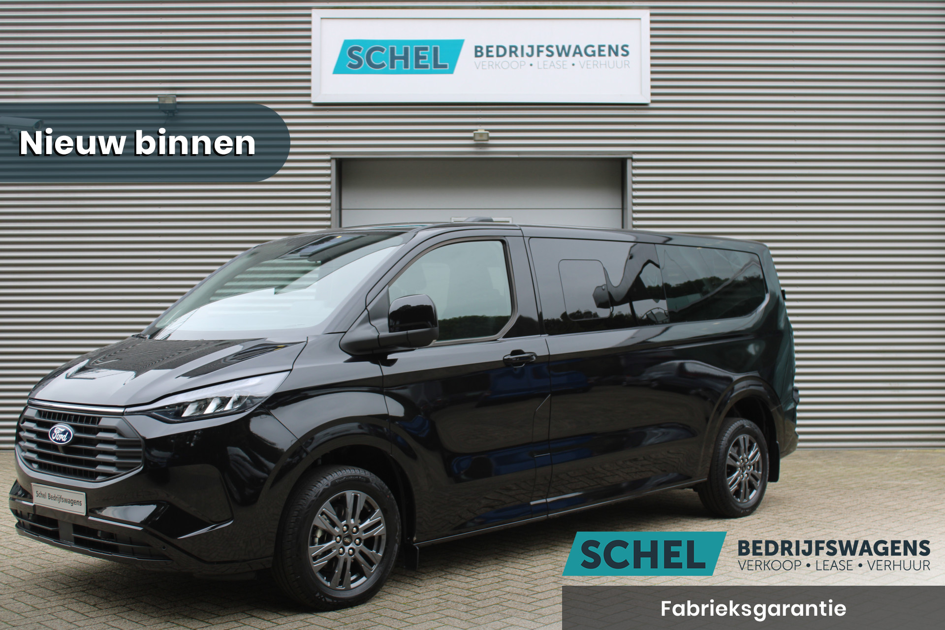 Ford Transit Custom 340 2.5 PHEV L2H1 Limited 232pk - 9 zits - Adaptive Cruise - Blind spot - Navi - Stuurverwarming - Airco achterin - Rijklaar