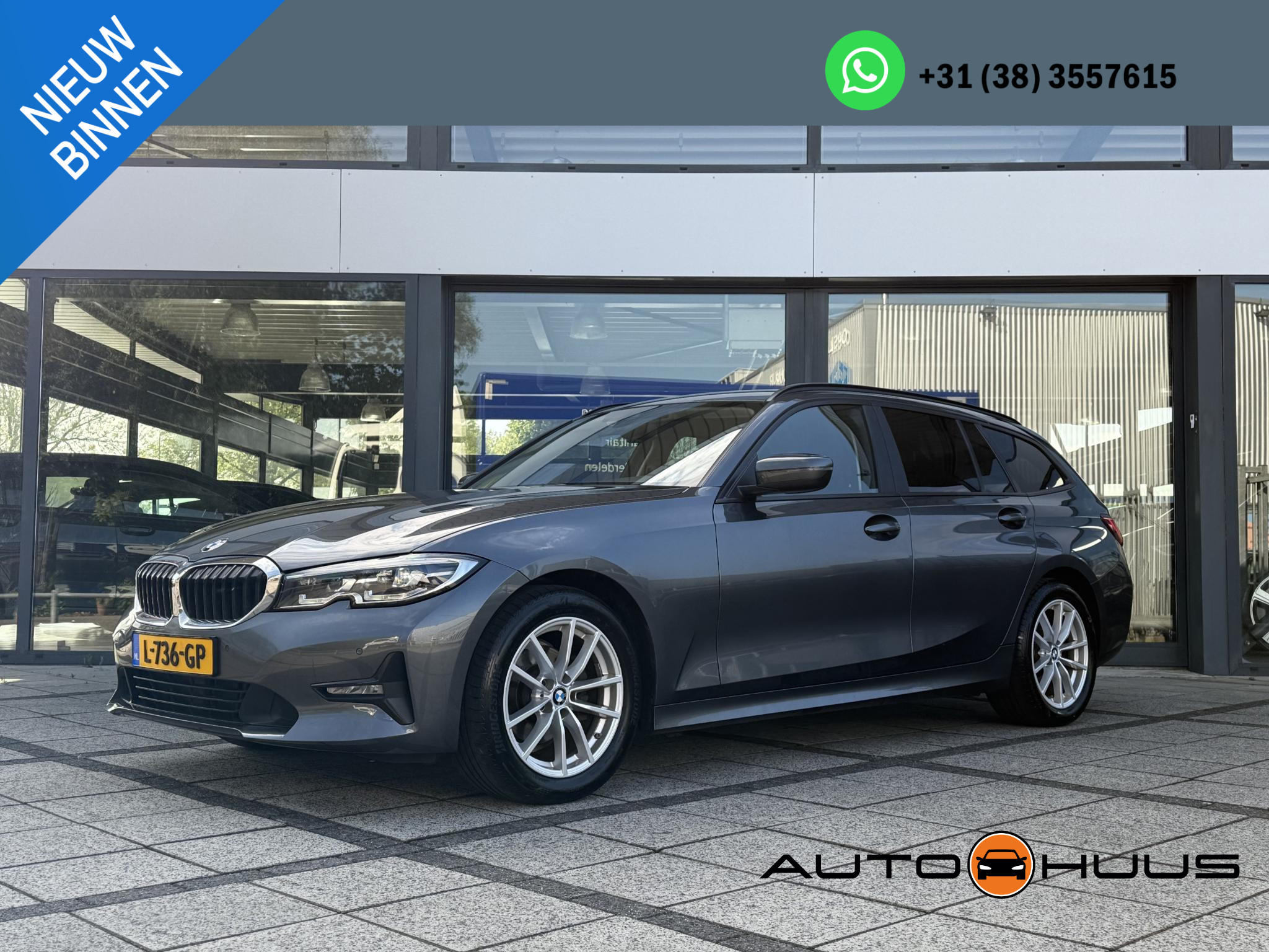 BMW 3 Serie Touring 318d Business Edition | Navi | ECC | Trekhaak |