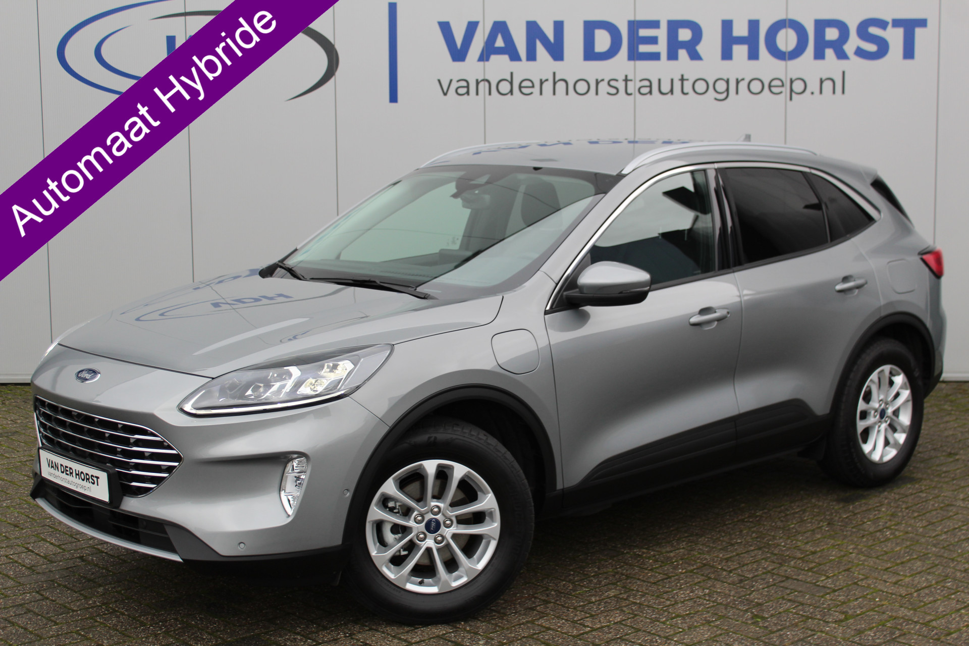 Ford Kuga 2.5-225pk PHEV Titanium X. Garantie t/m 06-02-2028 ! Slechts 11.000km ! Volautm. airco, camera v+a, LED verlichting, metallic lak, LM wielen, elektr. verstelb. comfortstoelen li+re, stuur-, stoel- en voorraamverw.,  adaptive cruise cntrl, lane- en side assist etc