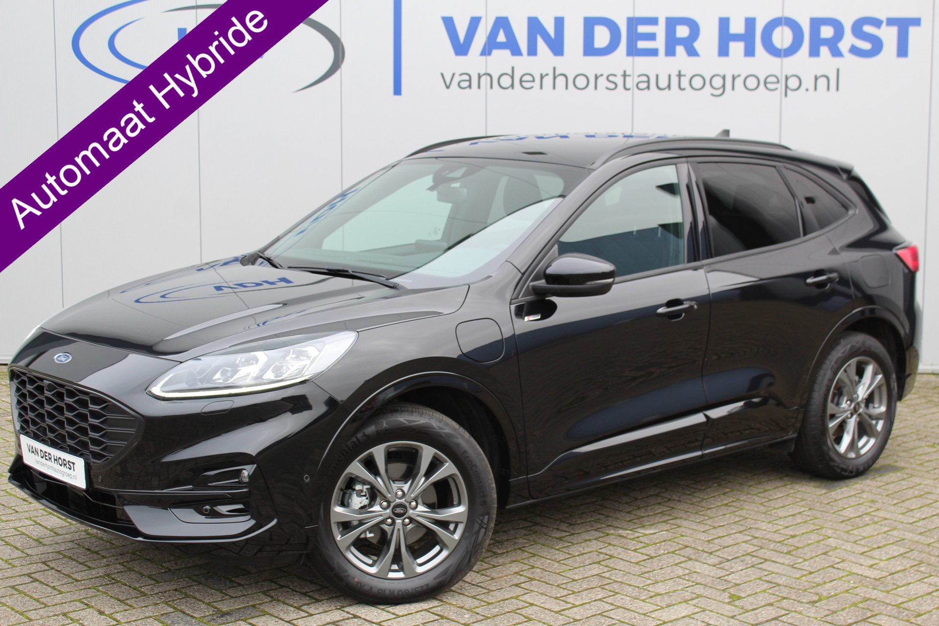 Ford Kuga 2.5-225pk PHEV ST-Line X. Let op ! Slechts 9.600km ! Volautm. airco dual, stoel- en voorraamverwarming, side- en lane assist, metallic lak, navigatie, telefoonvoorb., camera v+a, keyless entry/keyless go, elektr. achterklep, LM wielen, B&O soun