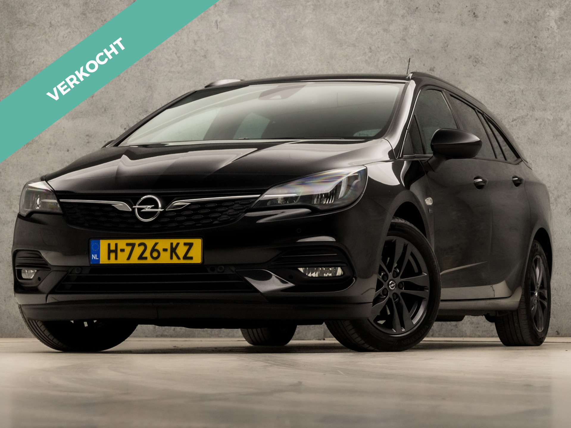 Opel Astra Sports Tourer 1.2 Sport (APPLE CARPLAY, NAVIGATIE, CLIMATE, ADAPTIVE CRUISE, GETINT GLAS, KOPLAMPEN, SPORTSTOELEN, PARKEERSENSOREN, NIEUWSTAAT)