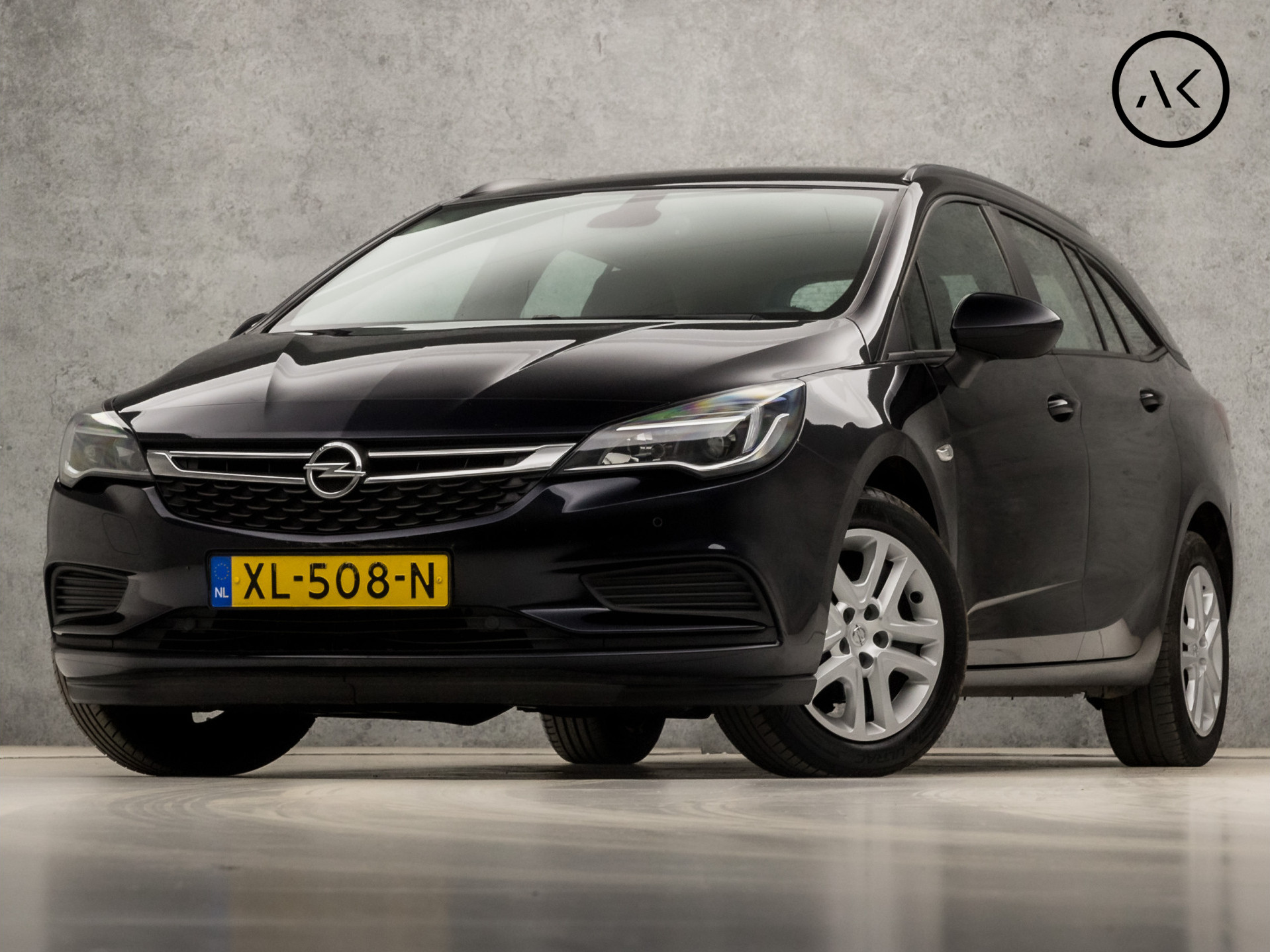 Opel Astra Sports Tourer 1.0 Sport (APPLE CARPLAY, GROOT NAVI, CRUISE, ELEK PAKKET, ARMSTEUN, SPORTSTOELEN, PARKEERSENSOREN, NIEUWE APK, NIEUWSTAAT)