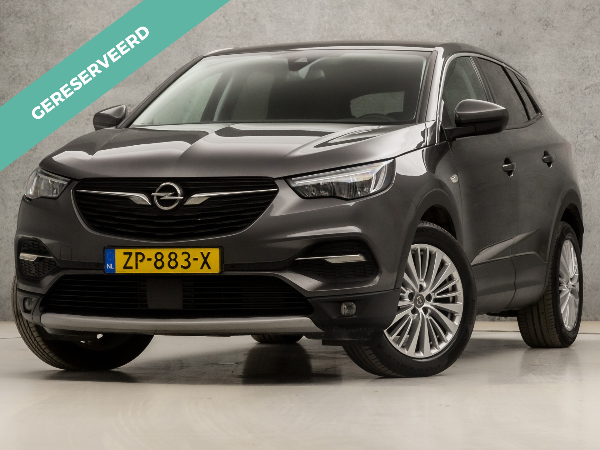 Opel Grandland X 1.2 Turbo Innovation (APPLE CARPLAY, GROOT NAVI, CLIMATE, LEDER, CAMERA, SPORTSTOELEN, GETINT GLAS, ELEK ACHTERKLEP, KEYLESS, NIEUWSTAAT)