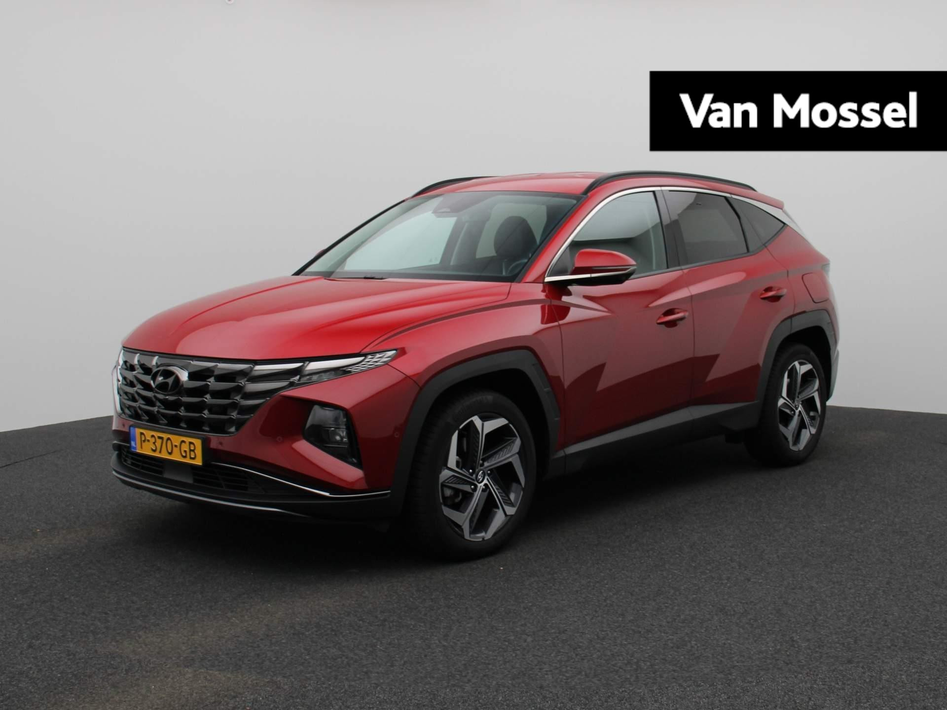 Hyundai Tucson Hybrid 1.6 T-GDI HEV Premium | Leder | Navigatie | Climate Control | Parkeersensoren | LMV | LED | Camera | Stuurverwarming | Stoelverwarming / verkoeling | Trekhaak | Apple CarPlay / Android Auto | Draadloos telefoonlader |