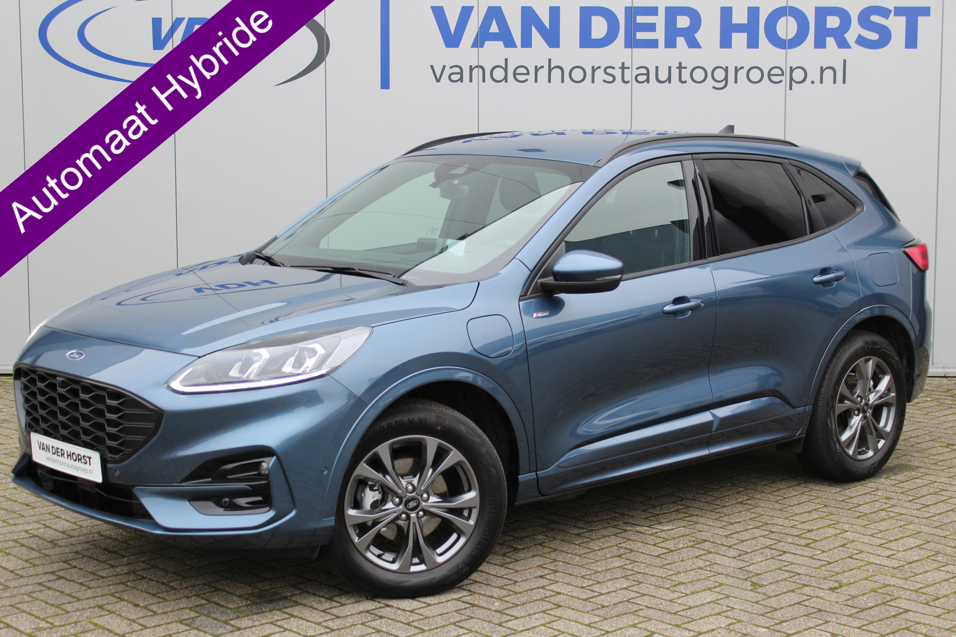 Ford Kuga 2.5-225pk PHEV ST-Line X. Fabrieksgarantie t/m 04-09-2027 ! Slechts 9.800km ! Volautm. airco, navigatie, B&O soundsyst., adaptive cruise control, lane- en side assist, stoel-, stuur- en voorraamverw., elektr. achterklep. elektr. trekhaak, LM wielen, camera v+a etc.