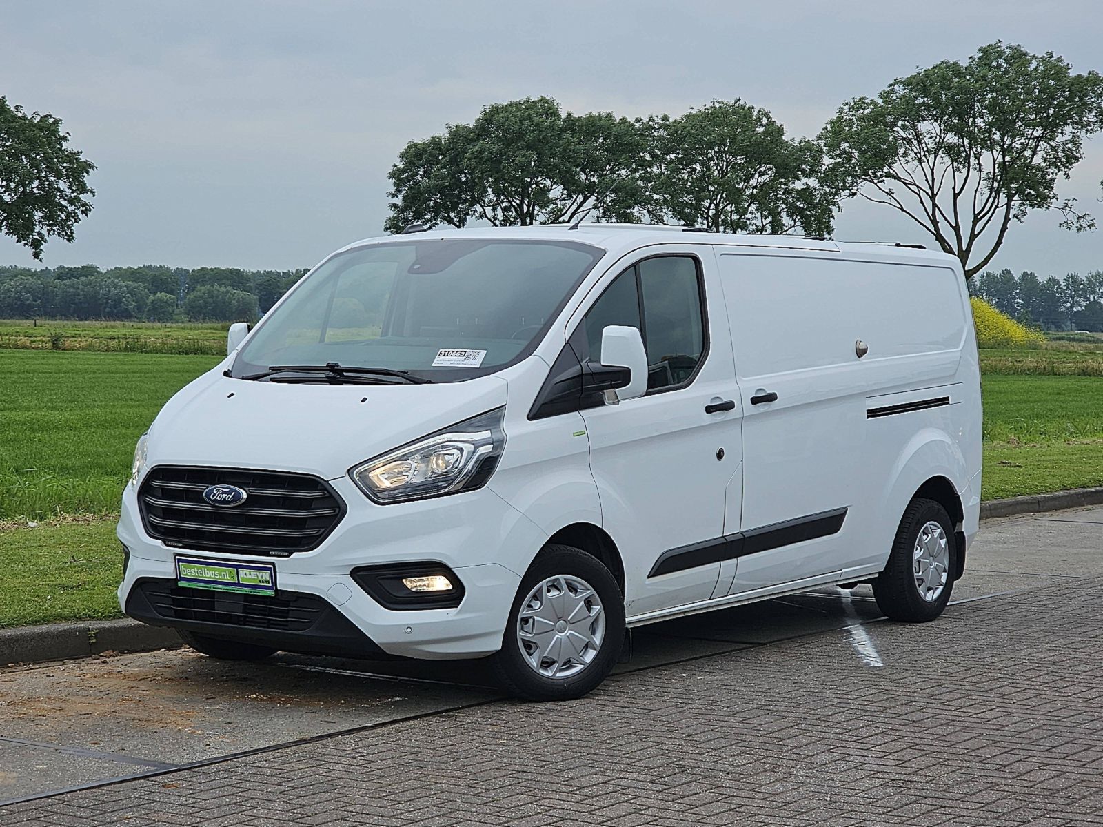 Ford Transit 130 2.0 TDCI L2H1 2x zijdeur,airco, navi, pdc, kastinrichting, trekhaak, 87 dkm.