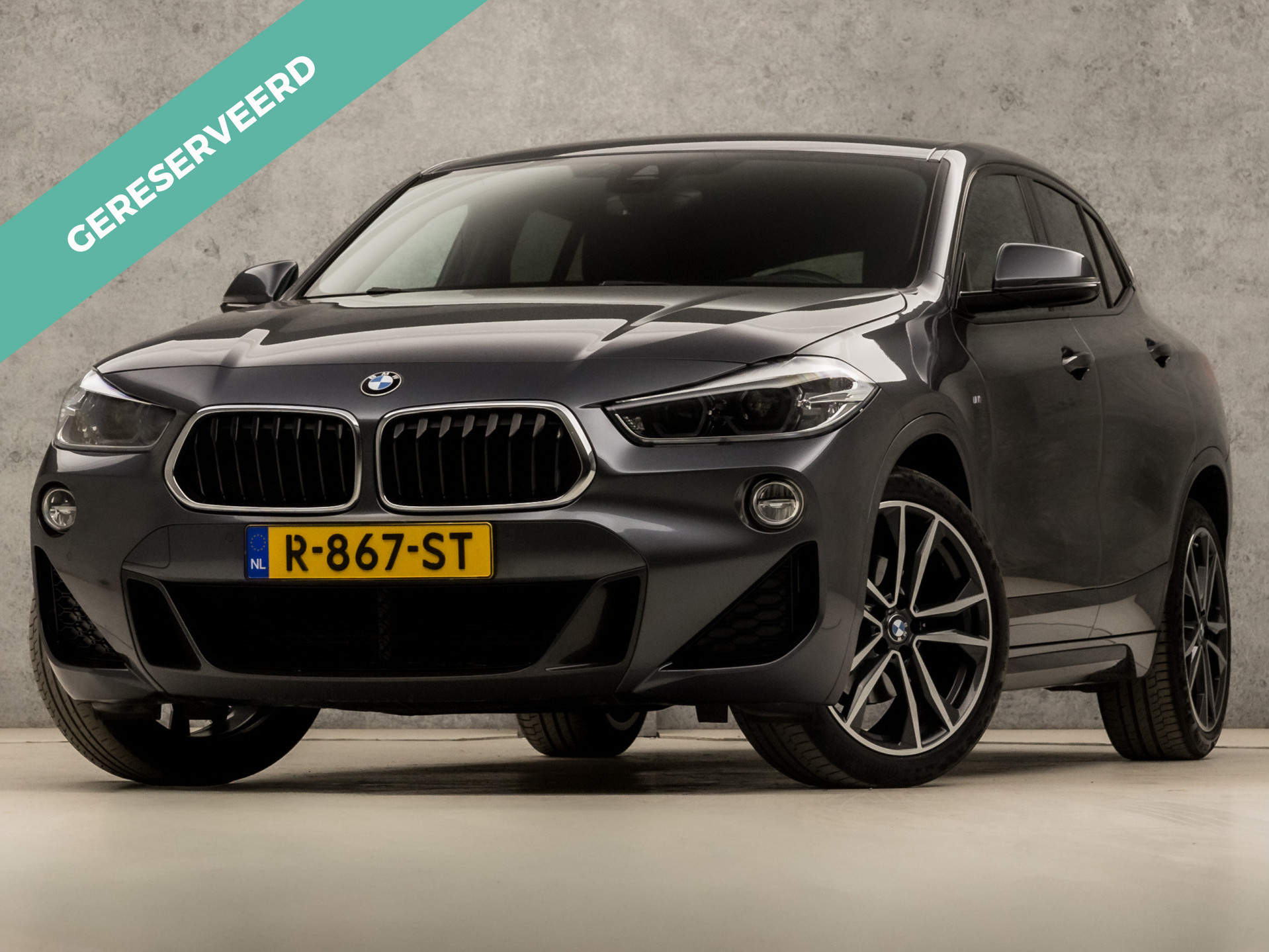 BMW X2 1.8i sDrive M Sport Automaat (NAVIGATIE, M PAKKET, CLIMATE, STOELVERWARMING, LEDEREN SPORTSTOELEN, CAMERA, GETINT GLAS, SFEERVERLICHTING, NIEUWSTAAT)